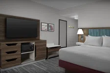 Thumbnail for Modern hotel room with a large bed, wall-mounted TV, wooden furniture, microwave, and framed artwork on the wall.