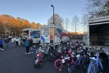 Thumbnail for a group of bicycles parked in a parking lot