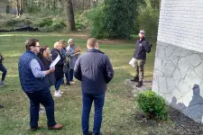 Thumbnail for a group of people standing outside