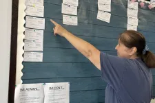 Thumbnail for MaidPro Salisbury employee pointing to their cleaning schedule