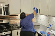 Thumbnail for MaidPro Chicago Downtown house cleaning professional cleaning a kitchen 