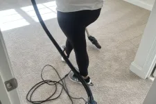 Thumbnail for MaidPro Charleston vaccuming a bedroom floor in North Carolina