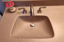 Thumbnail for a round metal object with buttons