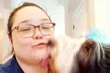 Thumbnail for MaidPro Salisbury employee taking care of a customer's dog