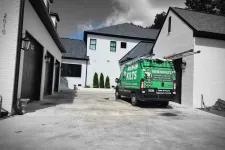 Thumbnail for a green van parked in a driveway