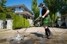 Thumbnail for a man holding a hose