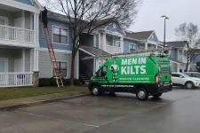 Thumbnail for a green truck parked on the side of a street