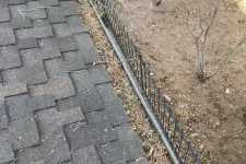 Thumbnail for a stone walkway with a fence