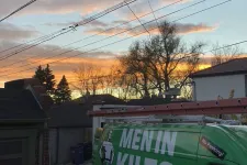 Thumbnail for a green van parked on a street