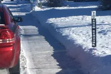 Thumbnail for a car parked on a snowy road