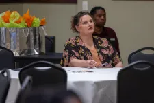 Thumbnail for a woman and a man sitting at a table