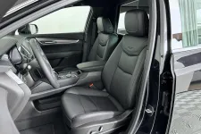 Thumbnail for Luxurious car interior with sleek leather seats and modern dashboard design.