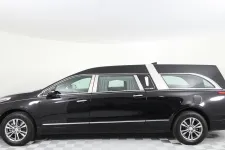 Thumbnail for Elegant black hearse with silver accents, showcasing a luxury vehicle design.