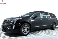 Thumbnail for Elegant black hearse showcasing luxurious design and sleek lines, perfect for professional services.