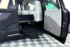Thumbnail for Elegantly designed hearse interior with a retractable platform and premium finishes.