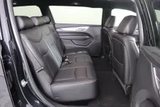Thumbnail for Interior view of a spacious SUV with black leather seating and a modern design.