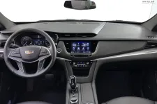 Thumbnail for Interior view of a modern Cadillac dashboard featuring advanced tech and sleek design elements.