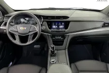 Thumbnail for Interior view of a modern Cadillac featuring a sleek dashboard and advanced technology interface.