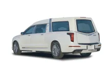 Thumbnail for Elegant white hearse with classic design, showcasing luxury and refinement in vehicle style.