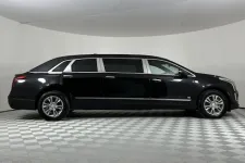 Thumbnail for Sleek black limousine showcased in a studio setting, highlighting luxury and elegance.