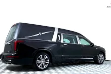 Thumbnail for A sleek black hearse with elegant details, showcasing modern professional design.