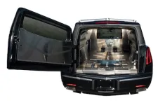 Thumbnail for Interior view of an elegant hearse with spacious compartments for transporting caskets.