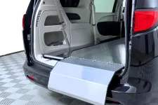Thumbnail for Interior view of a minivan with a lowered ramp for accessibility features.