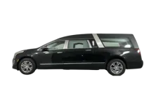 Thumbnail for Elegant black hearse with sleek design and tinted windows, perfect for funeral services.