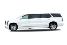 Thumbnail for Side view of a white luxury extended limousine SUV isolated on white background.