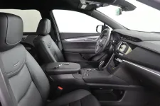 Thumbnail for Interior view of a modern car showcasing sleek black leather seats and a stylish dashboard design.