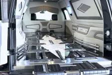 Thumbnail for Interior of a luxury vehicle featuring sleek design and spacious seating.