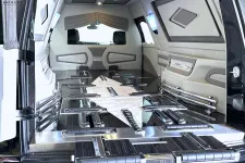 Thumbnail for Interior of a luxury car featuring sleek black and silver design with a spacious layout.