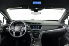 Thumbnail for Stylish Cadillac car interior showcasing modern dashboard and touchscreen features.
