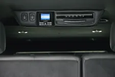 Thumbnail for Car interior roof panel with JL Audio control screen and climate control buttons above rear seats.