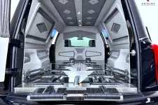 Thumbnail for Luxurious interior of a black van showing spacious seating and modern design elements.