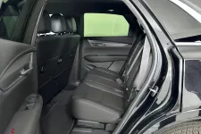 Thumbnail for Interior view of a spacious SUV back seat with black leather seats and a clean design.