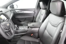 Thumbnail for Interior view of a luxurious Cadillac car featuring sleek black leather seats.