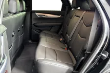 Thumbnail for Interior view of a modern vehicle’s spacious rear seating area with leather upholstery.