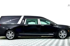 Thumbnail for Black hearse with a sleek design, showcasing professional funeral vehicle features.