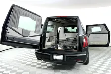 Thumbnail for Luxurious hearse interior showcasing spacious design and elegant finishes for transporting loved ones.