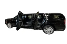 Thumbnail for Black luxury SUV with doors open, showcasing spacious interior and modern design features.