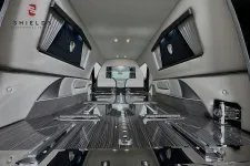 Thumbnail for Luxurious interior of a limo featuring sleek designs and polished surfaces.