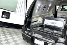 Thumbnail for Interior of a stylish hearse with modern features and elegant design elements.
