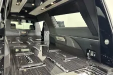 Thumbnail for Luxurious interior of a modern SUV with sleek finishes and spacious layout.