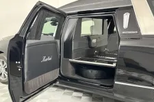 Thumbnail for Interior view of a luxury hearse featuring spacious seating and a sleek design.