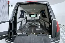 Thumbnail for Interior view of a luxury hearse with spacious seating and elegant design features.