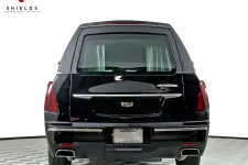 Thumbnail for Rear view of a black Cadillac with sleek design and premium features.