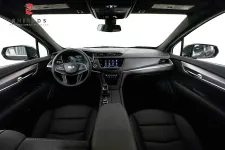 Thumbnail for Interior view of a modern Cadillac showcasing sleek design and advanced technology features.