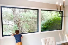 Thumbnail for a child looking out a window