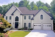 Thumbnail for Gray house with white and black trim and black MaxCraft double entry door
